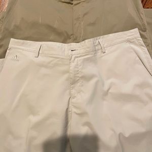 Two pairs of golf pants, NIKE and ADIDAS